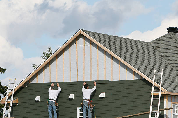 Professional Storm Damage Siding Repair technician working in Fulton, MD